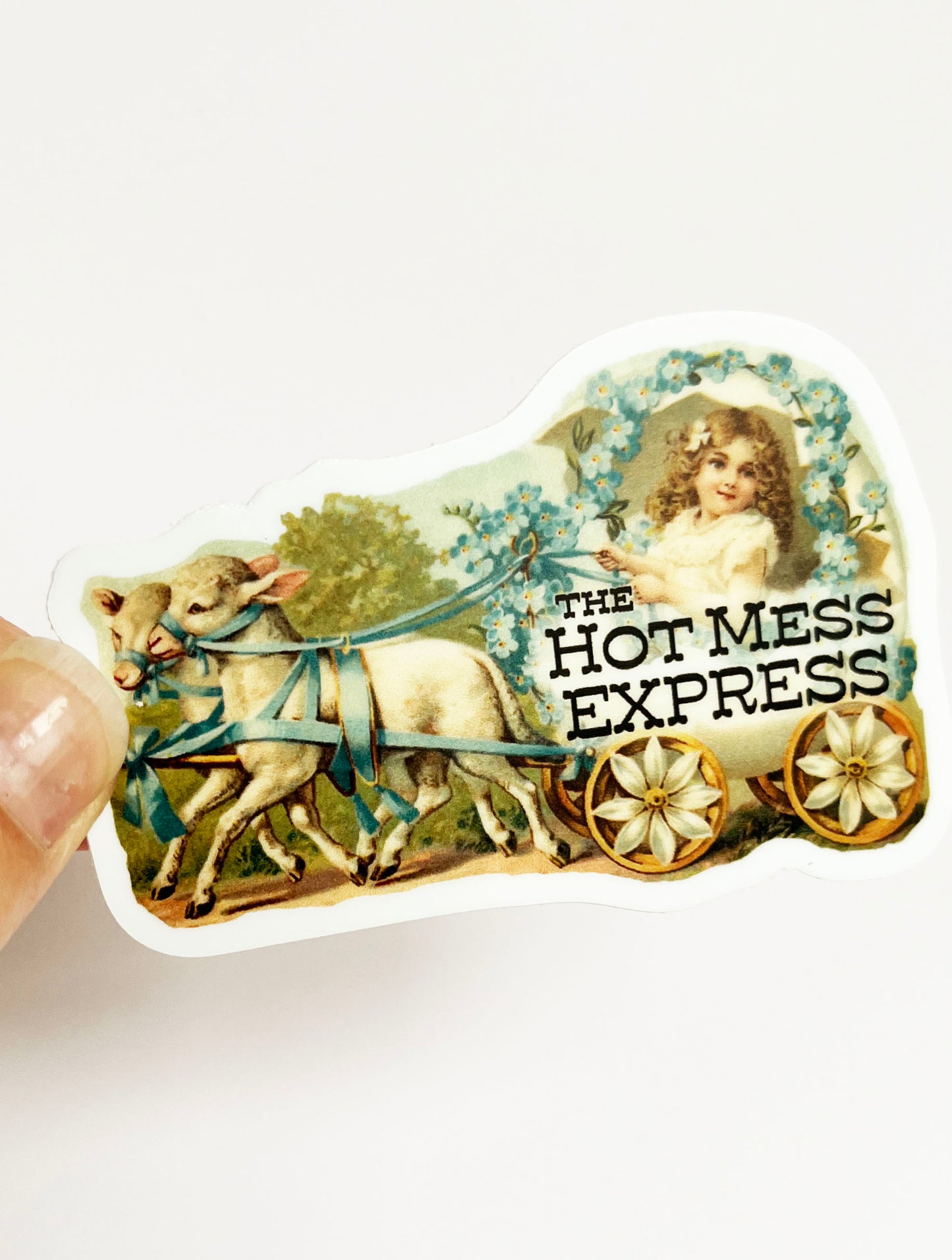 the hot mess express sticker vintage design girl in carriage pulled by sheep green blue flowers pretty funny snarky stickers coin laundry montana