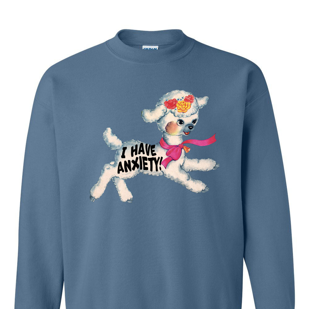 Blue sweatshirt with a cartoon sheep and text that says “I have anxiety”