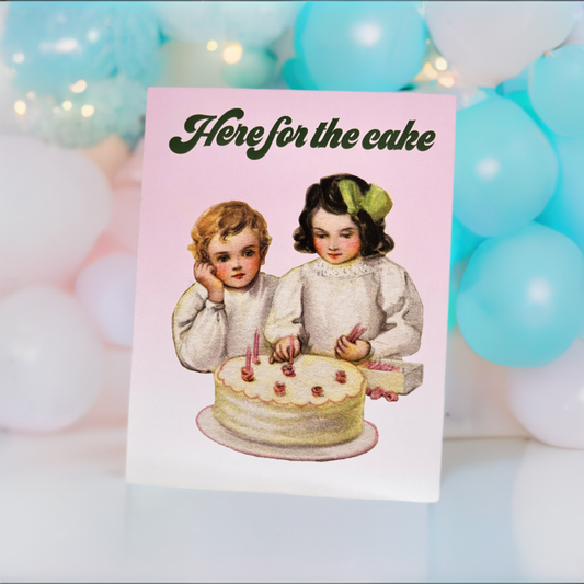 Vintage-style card with two children and a cake, surrounded by colorful balloons.