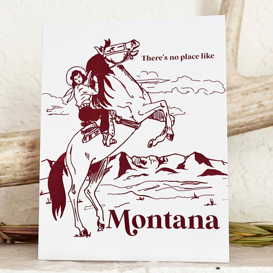 Card with a horse and rider illustration and 'There's no place like Montana' text on a white background.