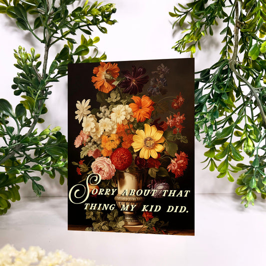 Floral arrangement card with sorry about that thing my kid did text on a decorative background