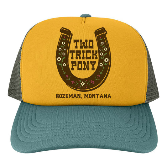 Yellow and blue trucker hat with 'Two Trick Pony' logo and text on a white background