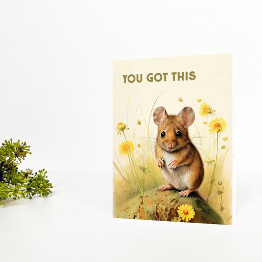 Card of a mouse in a field with 'YOU GOT THIS' text on a light background