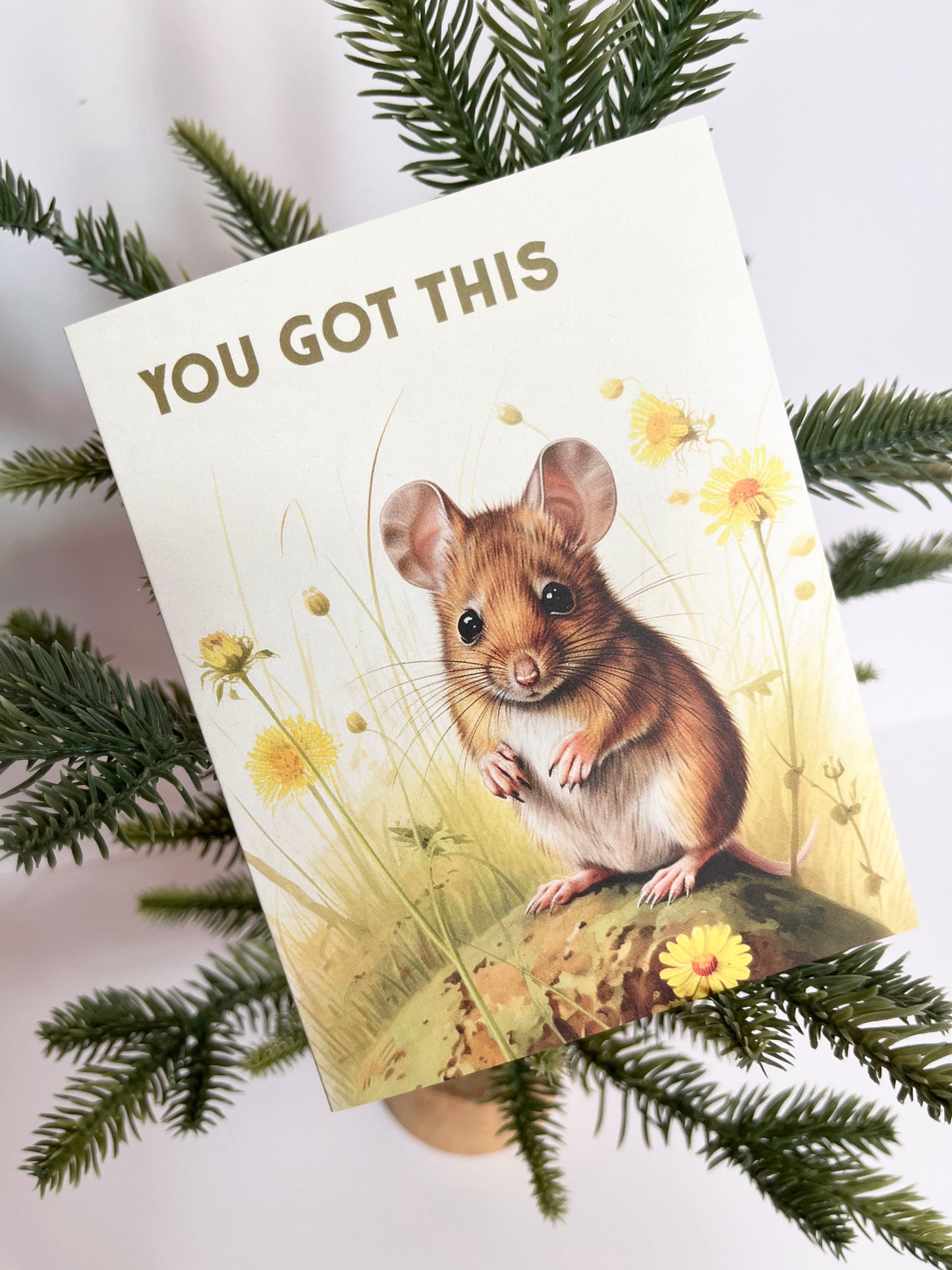 Greeting card with a mouse in a field of flowers on it with text that says “You got this”